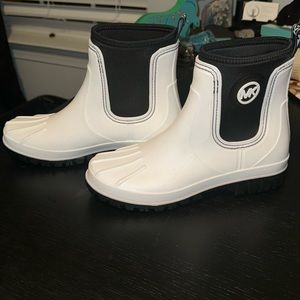 Brand new Michael Kors Duck boots